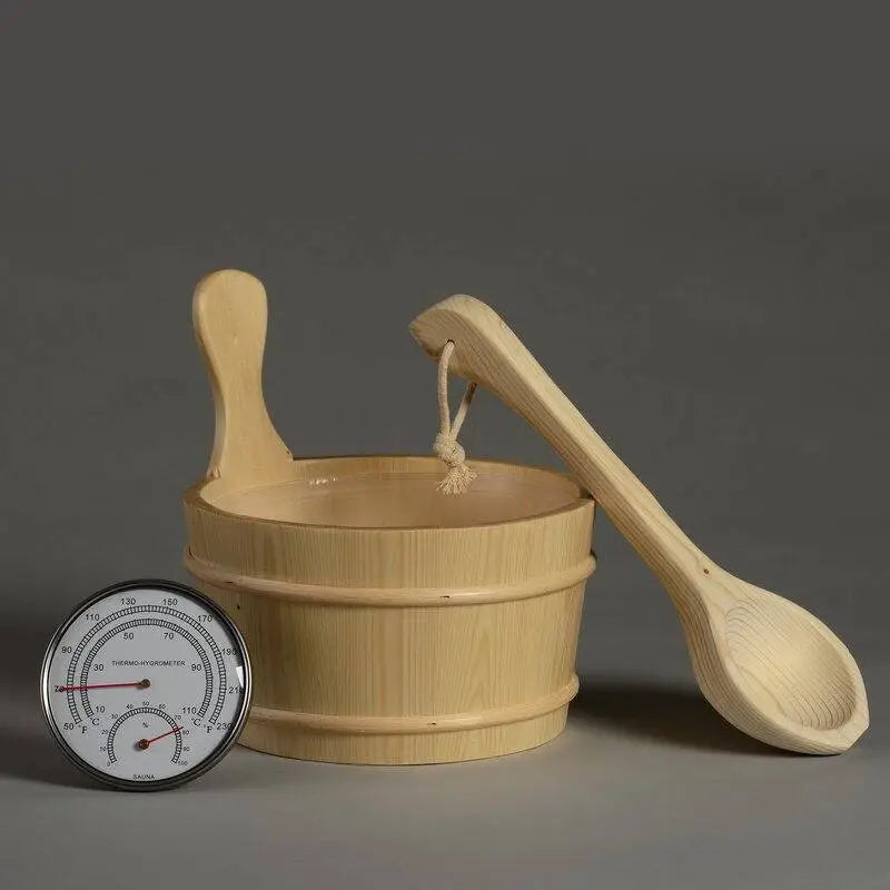 Wooden bucket with ladle and thermometer on a dark background
