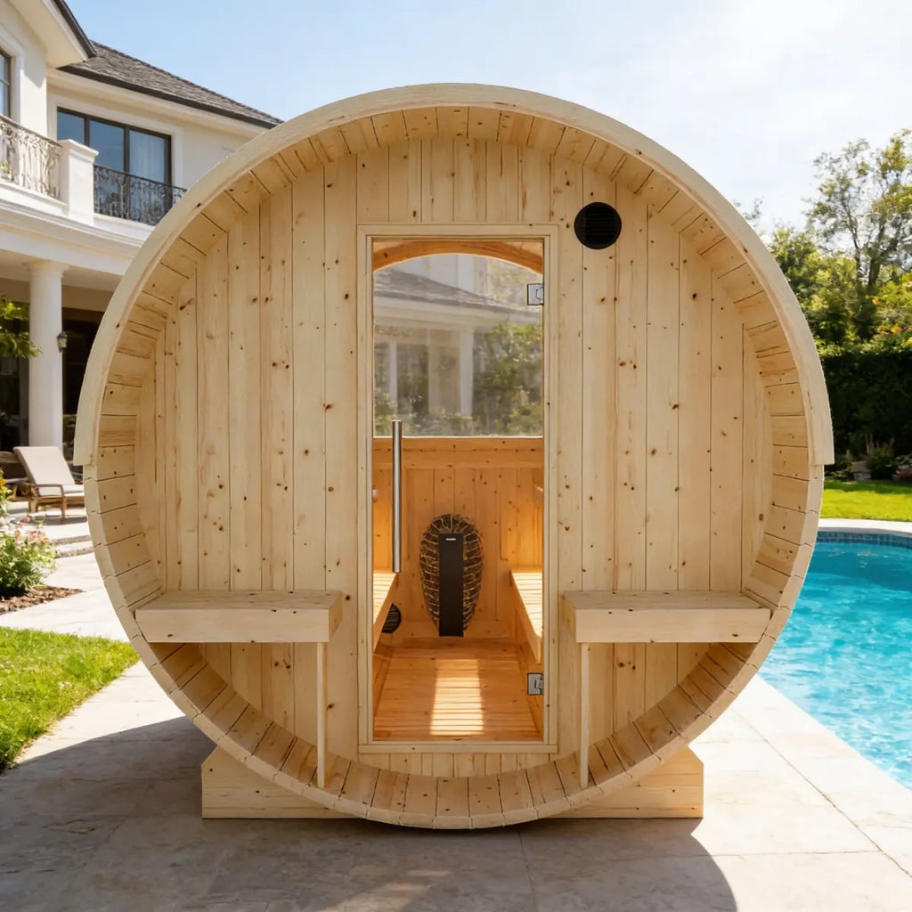 Wooden barrel-shaped sauna by a pool with a house in the background