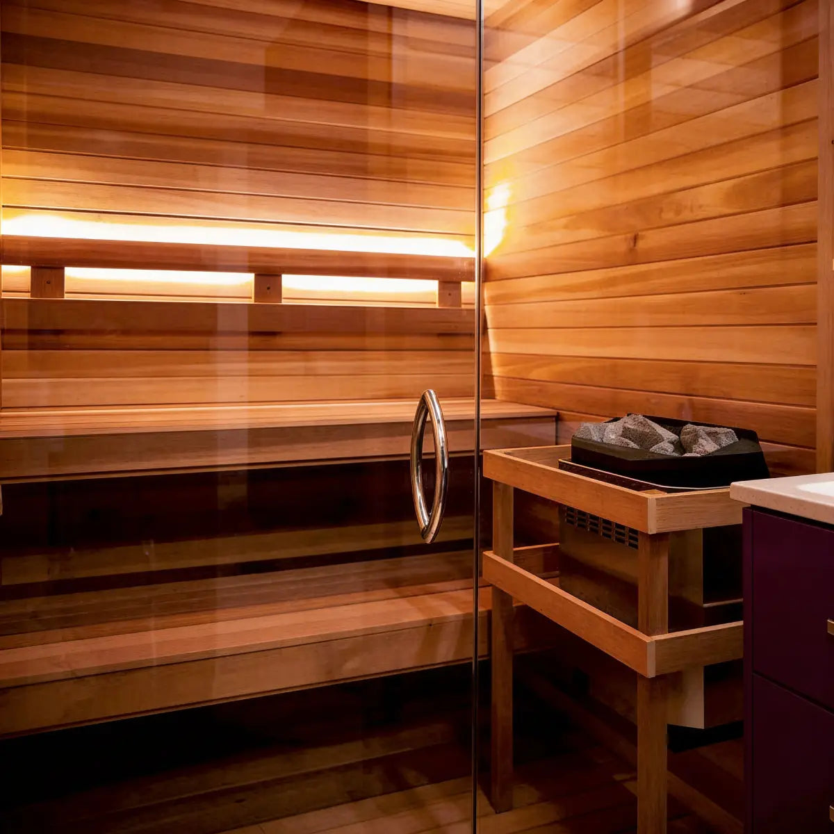 Wooden sauna with glass door and interior details